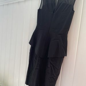 New with tag peplum dress. Size 0 Above the knee